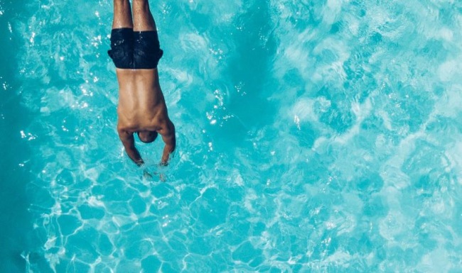 a man swimming in the water